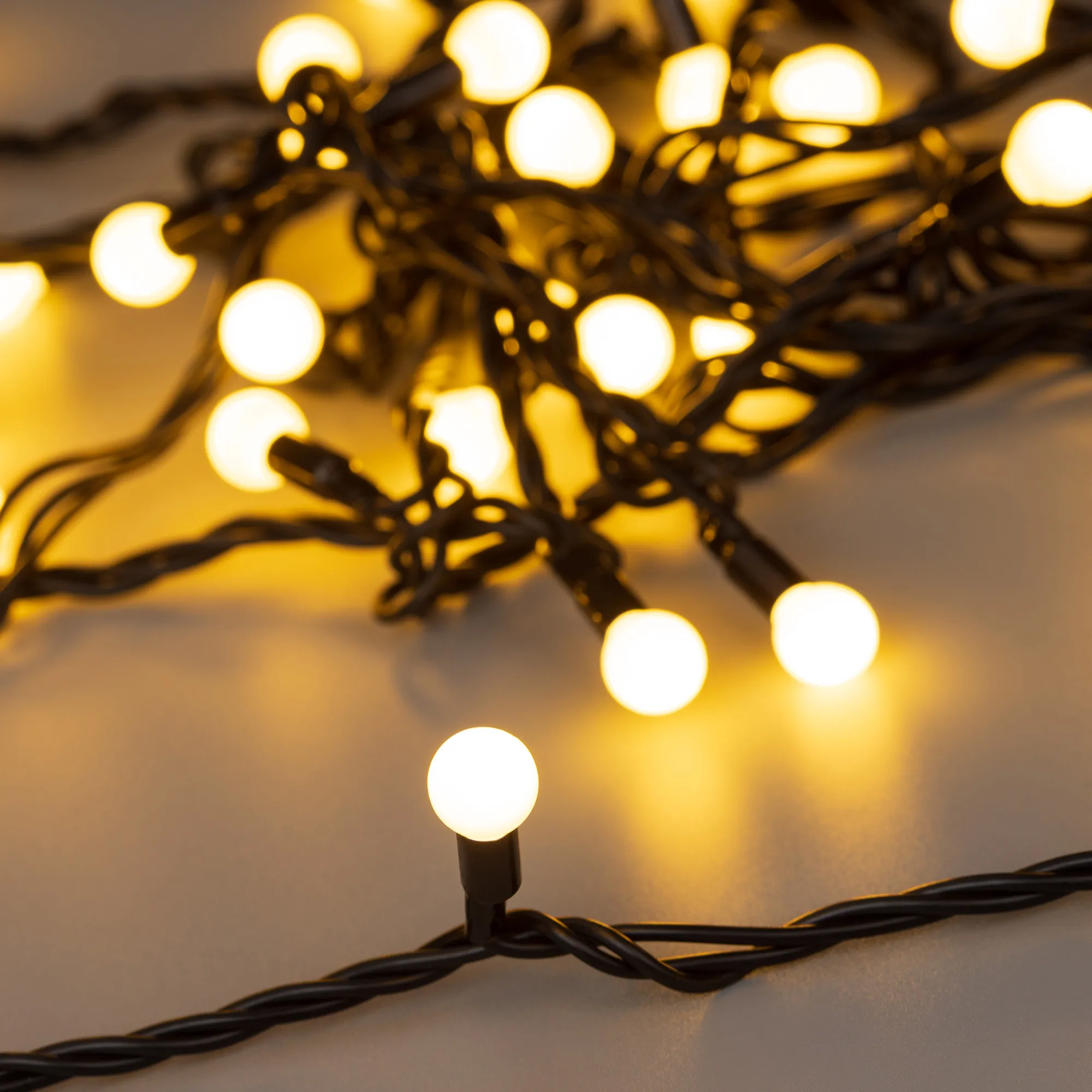 Светодиодная гирлянда ARD-BALL-CLASSIC-D13-5000-BLACK-50LED WARM (230V, 3.5W) (Ardecoled, IP65) - изображение товара